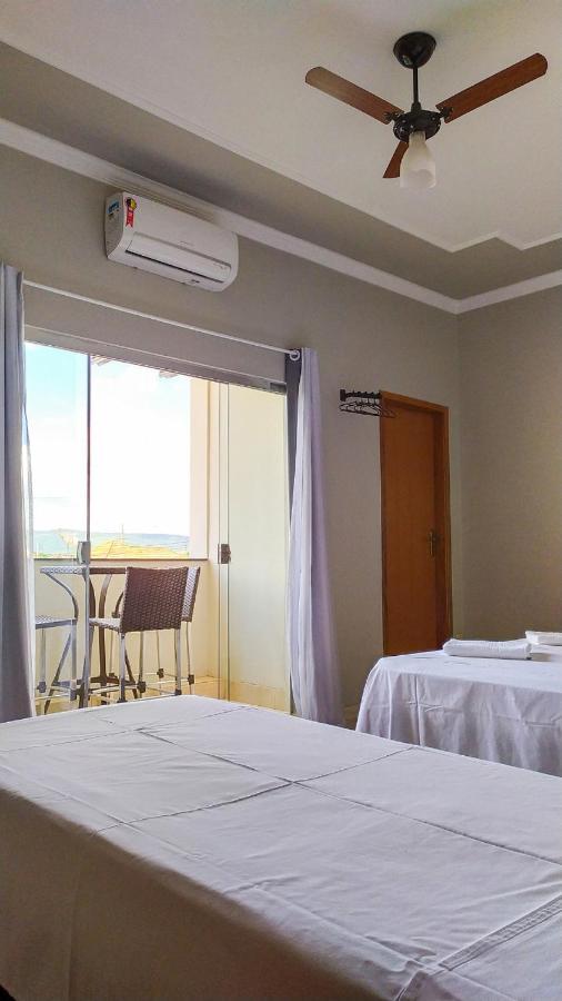 Pouso Oliveira Suites Сан-Жуан-Батиста-ду-Глория Экстерьер фото
